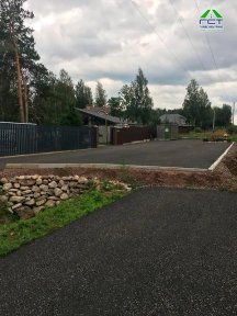 Фото | Укладка асфальтовой крошки при помощи асфальтоукладчика