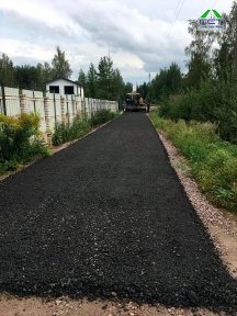 Фото | Укладка асфальтовой крошки при помощи асфальтоукладчика