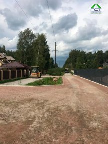 Фото | Укладка асфальтовой крошки при помощи асфальтоукладчика