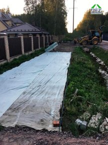 Фото | Укладка асфальтовой крошки при помощи асфальтоукладчика