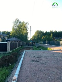 Фото | Укладка асфальтовой крошки при помощи асфальтоукладчика