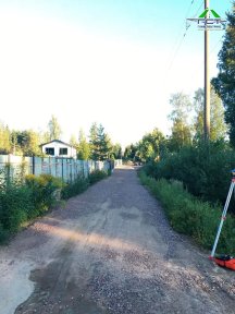 Фото | Укладка асфальтовой крошки при помощи асфальтоукладчика