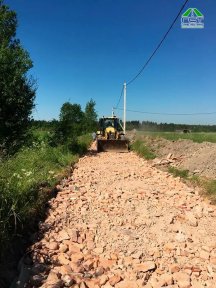 Фото | Строительство дороги в посёлке Романовка