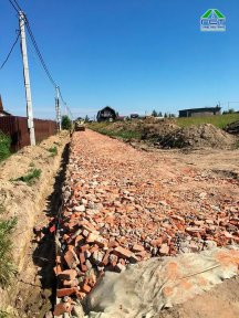 Фото | Строительство дороги в посёлке Романовка