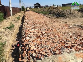 Фото | Строительство дороги в посёлке Романовка